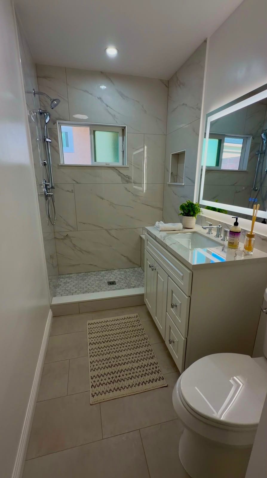 Completed bathroom remodeling project by Cali-Mex Construction in Southern California