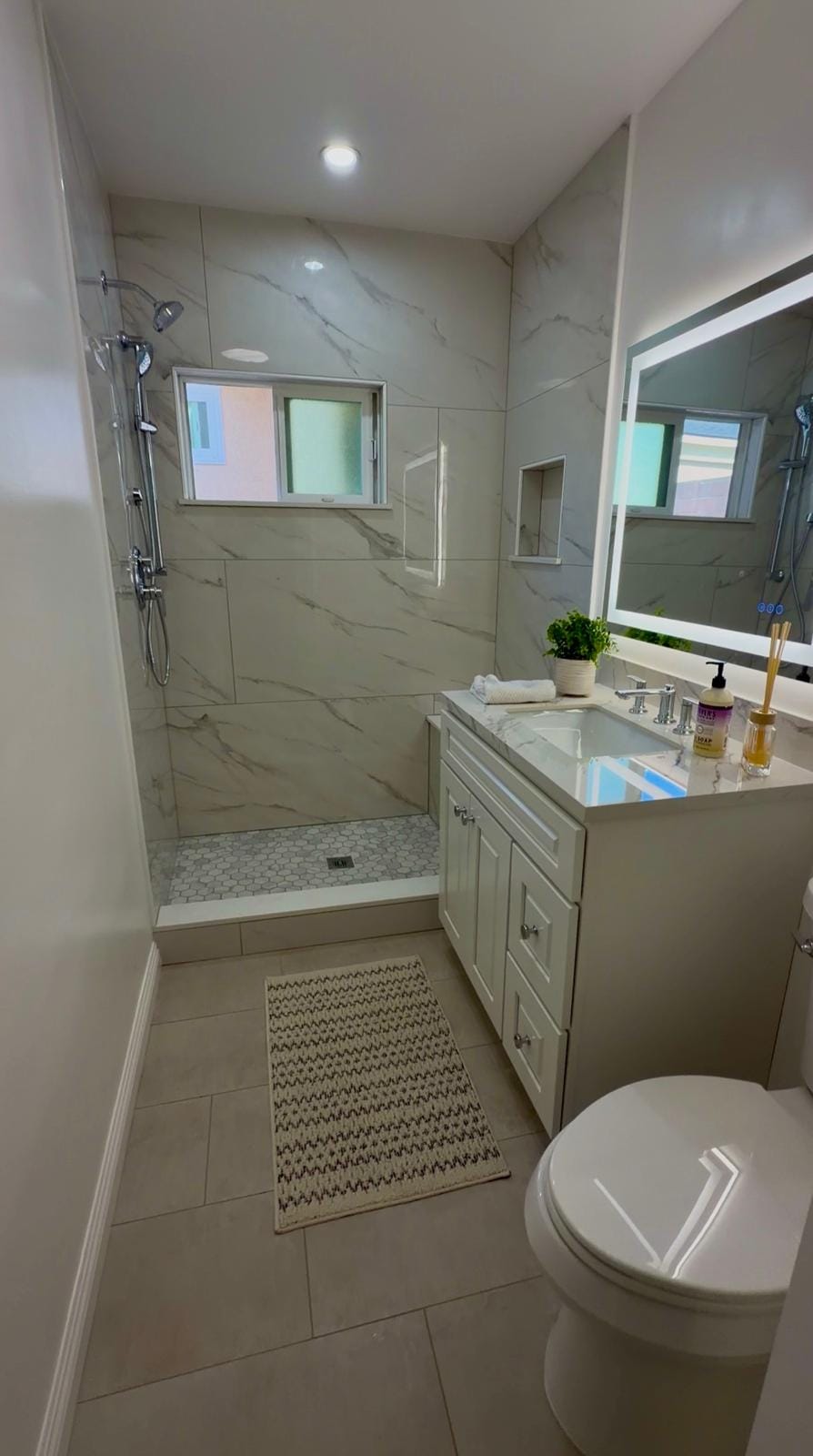 Bathroom shower area after tile remodeling by Cali-Mex Construction